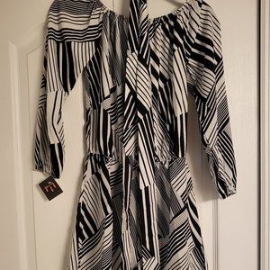 Black and white design romper with belt